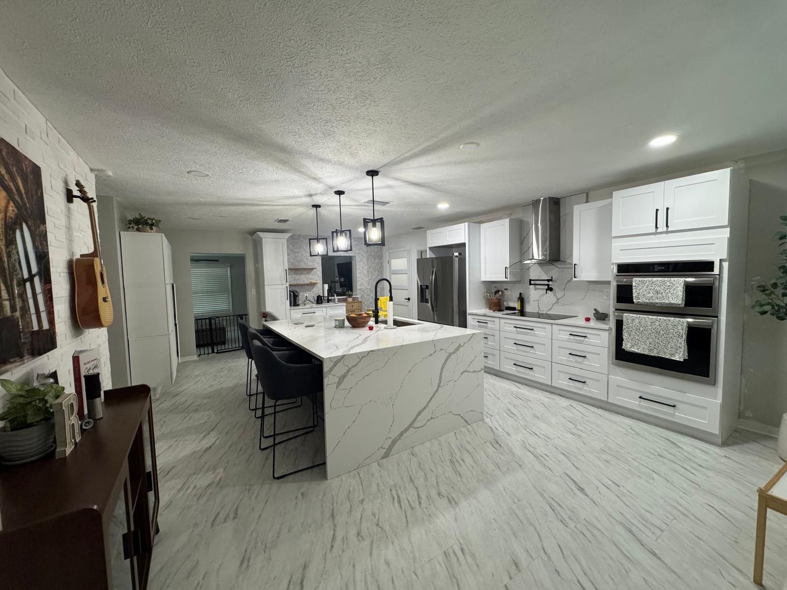 Finished Tampa Bay kitchen remodel with a large white island